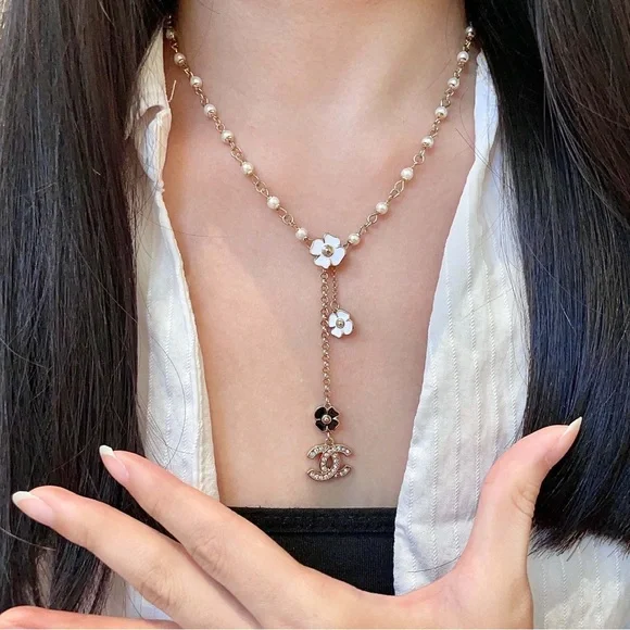 CHANEL Gold and White Floral Necklace - Picture 3 of 9